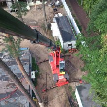 koku zāģēšana ar pacēlāju